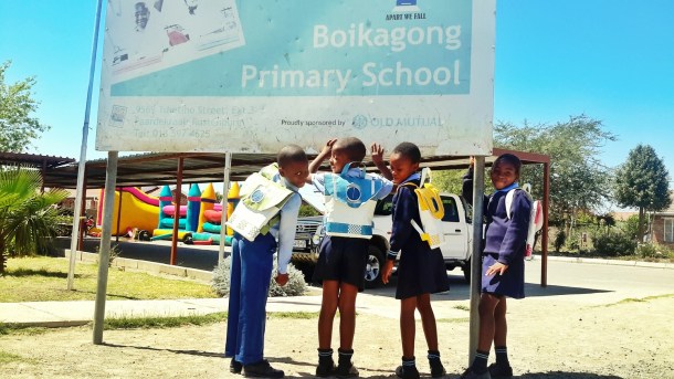 Photo Credit: Pupils from Boikagong Primary School wearing Repurposed Schoolbags (N.D) Retrieved 12/20/2015 from http://www.repurposeschoolbags.com/anatomyofaschoolbag/